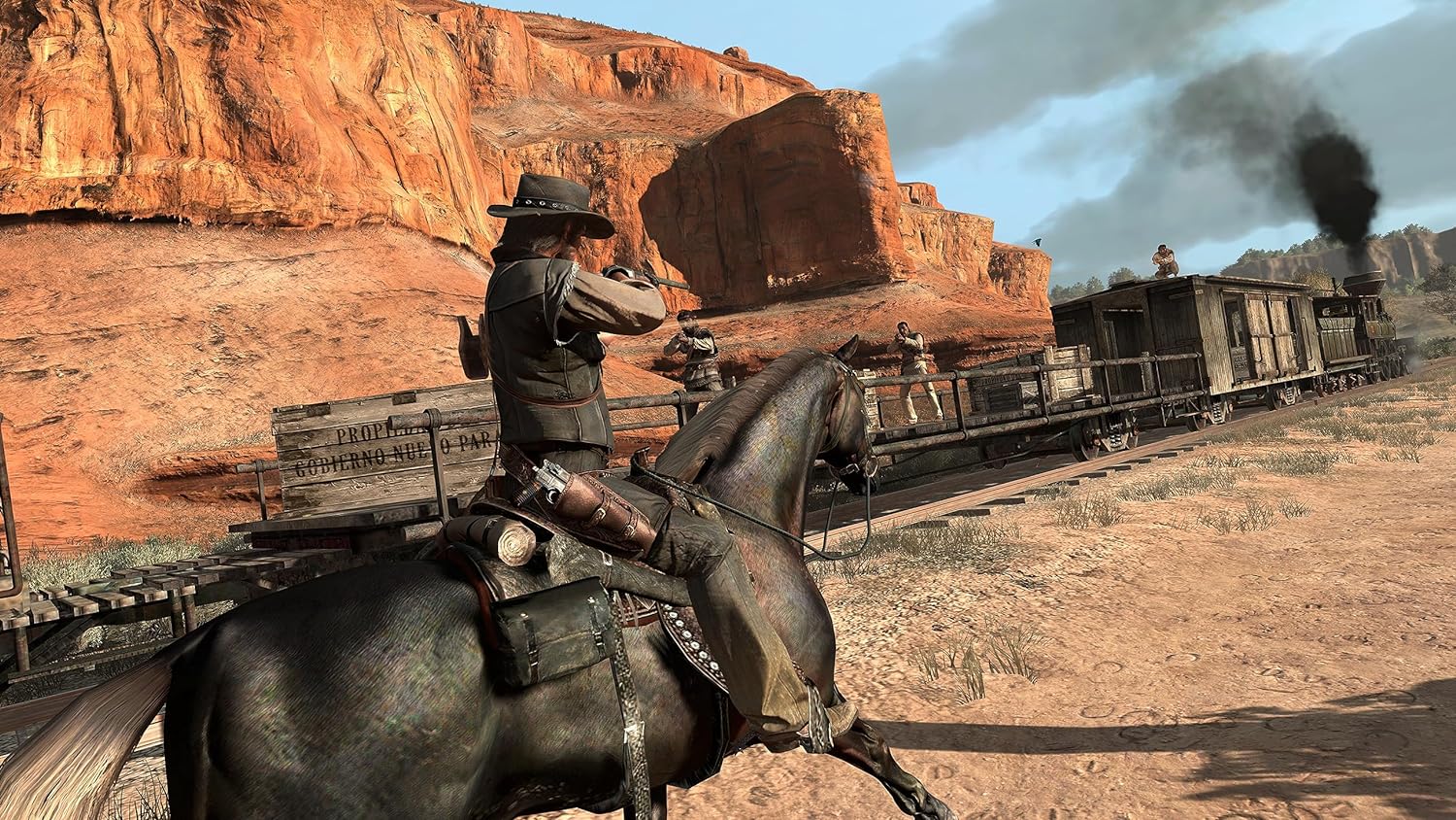 A gameplay screenshot from Red Dead Redemption ported to PS4.  John Marston (the protagonist) rides a horse, points his gun at a moving train and is shot by the outlaws.  Dark smoke billows from the train engine, with the rocky southwestern terrain visible behind it.